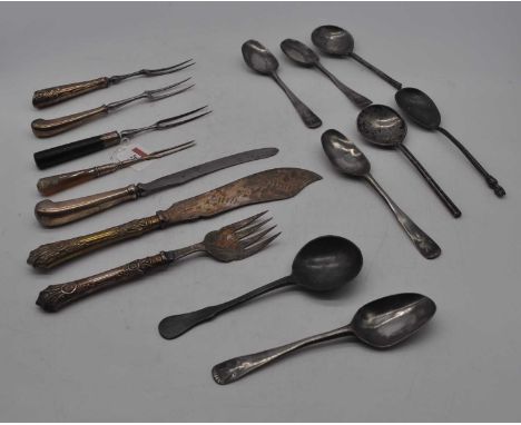 A collection of loose 18th century and later flatware to include pewter soup spoon, table spoon, ebony handled and white meta