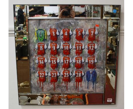 A modern framed print of the Arsenal football team shirts, 49x49cm, housed in a mirrored frame