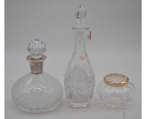 An Elizabeth II silver collared cut glass decanter, of mallet form, Birmingham 1990, height 23cm, together with another decan