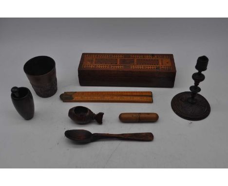 A collection of miscellaneous items to include a 19th century treen nutcracker, a 19th century apothecary's treen pestle &amp