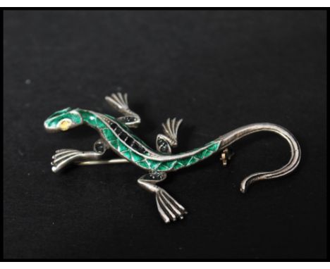 A vintage&nbsp; silver brooch pin in the form of a lizard with enamel decoration having a&nbsp; roller clip clasp . Marked Si