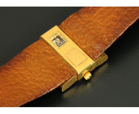A 1960's Lip Jump Hour wristwatch, with leather strap. CONDITION REPORT: The watch winds and appears to be ticking and operat
