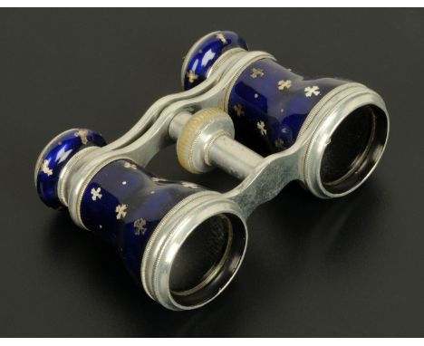 A pair of aluminum opera glasses, with blue enamel.   CONDITION REPORT: The lenses are in good order, no signs of any cracks 