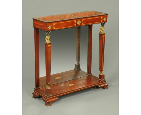 A George III mahogany console table, the inlaid frieze supported by figural columns and with low shelf and raised on bracket 