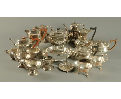 A large quantity of silver plated wares, including four piece tea service, two pairs of sauce boats, teapot and coffee pot (x