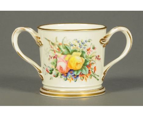 A 19th century porcelain loving cup, William Shaw and with rose bouquet to one side.  Height 10 cm.  