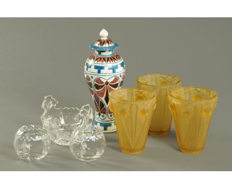 Three yellow tinted moulded glass light shades, a pair of enamelled glass globular squat vases, a cut glass basket by Waterfo