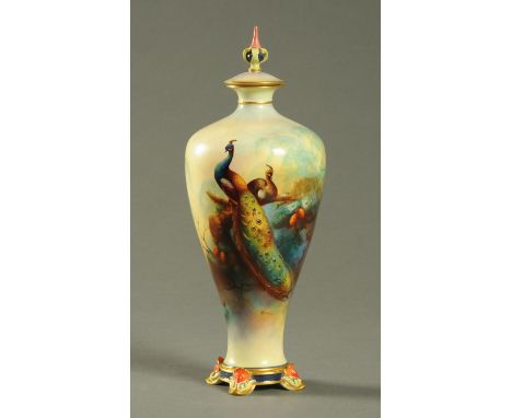 A Royal Worcester vase, decorated with peacocks, signed "White", lidded, green printed mark.  Height 30 cm (see illustration)