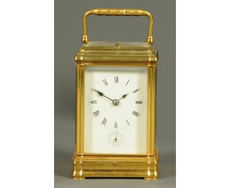 A French brass carriage clock by Richard & Co., Grand Sonnerie with repeat mechanism and alarm, 1969 grams, cased.  Height ex