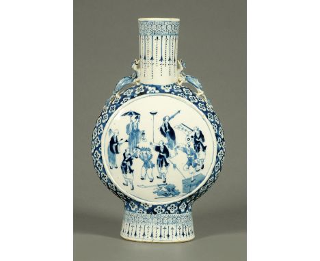 A large 19th century Chinese blue and white moon flask, decorated with figures with parasols, weapons, fans, etc.  Height 45 