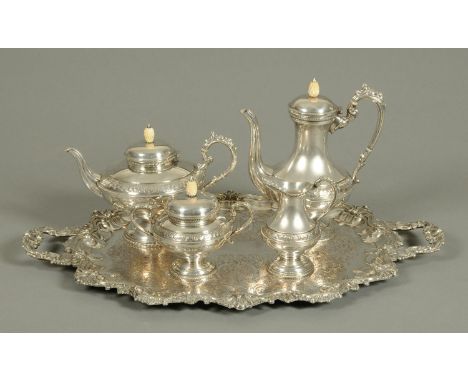 A Regency style silver plated four piece tea service, hand chased and with accompanying tray.  Tray length 71 cm. 