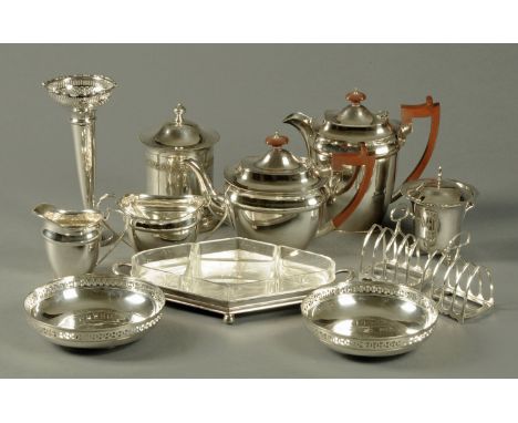 A four piece silver plated tea service, pair of toast racks and other plated ware. 