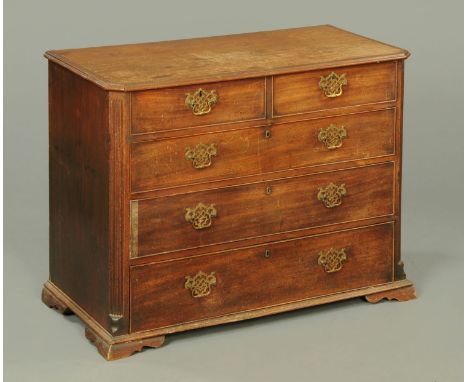 A George III Lancashire mahogany and crossbanded chest of drawers, with two short and three long drawers with brass drop hand