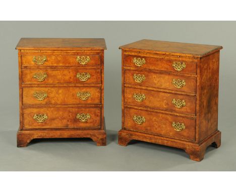 A pair of George III style walnut veneered small chests of drawers, each with quarter veneered top, reentrant corners, four l