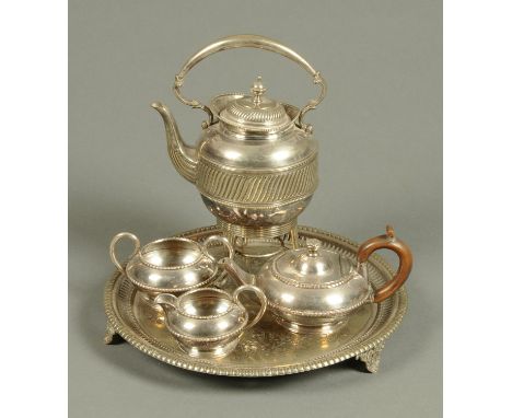 A Victorian silver plated spirit kettle, three piece plated tea service and plated tray. 