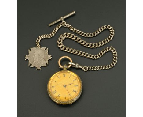 An engine turned and foliate engraved fob watch and chain with cut Kruger fob.