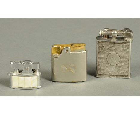 A vintage silver cigarette lighter, London 1936, and two others, plated. 
