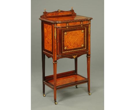 A fine Edwardian inlaid mahogany and specimen wood side cabinet, with rear upstand, panelled door and raised on tapered legs 