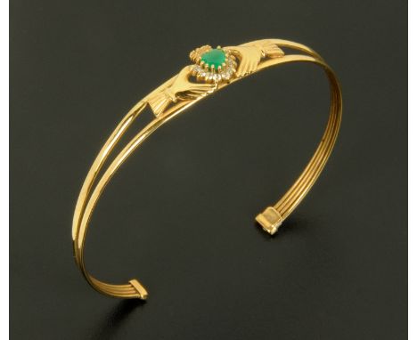 A 9 ct gold jadeite bangle, 5.3 grams.