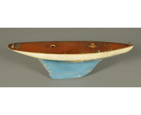 An Edwardian pond yacht hull, bearing plaque "Clyde Model Dockyard & Engine Depot, Glasgow", with simulated planked deck and 