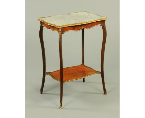 An early 20th century Continental marble topped occasional table, of serpentine outline and raised on four cabriole legs with