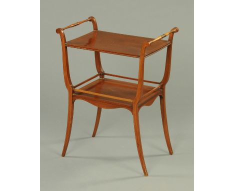 An Edwardian inlaid mahogany occasional table, with carrying handle to either side and raised on sabre legs united by a shelf