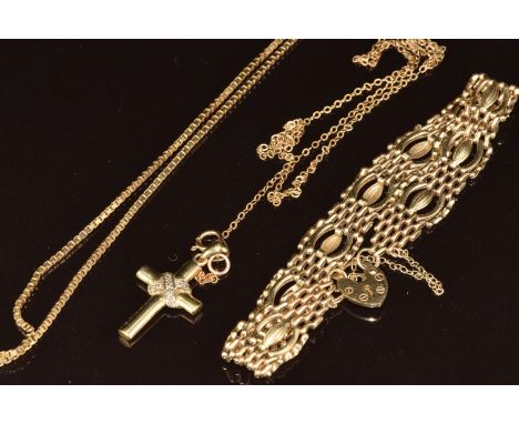 A 9ct gold necklace made up of box links, a 9ct gold gate bracelet with heart padlock clasp and a 9ct gold cross pendant set 