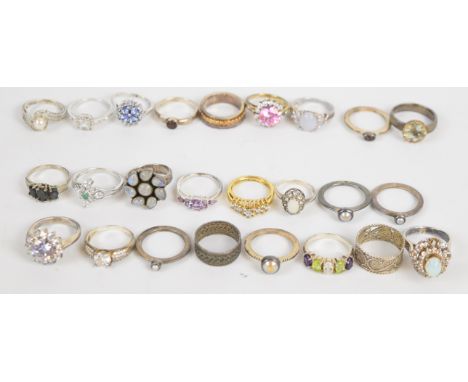 Twenty four silver rings including filigree, pearls, cubic zirconia, labradorite, etc (86.5g) together with a white metal rin