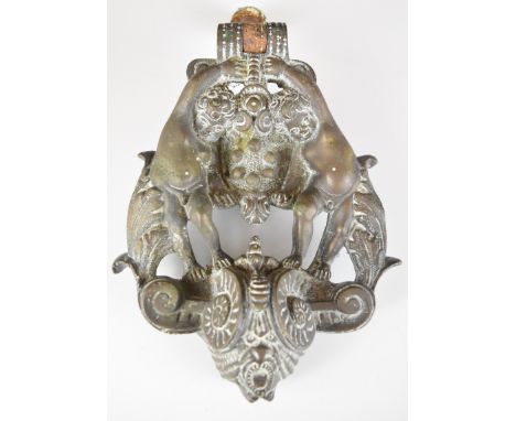 19th or early 20thC brass door knocker, decorated with a pair of cherubs, length 21cm