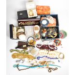 A collection of jewellery including a silver ring set with tiger's eye, rose quartz necklace,
