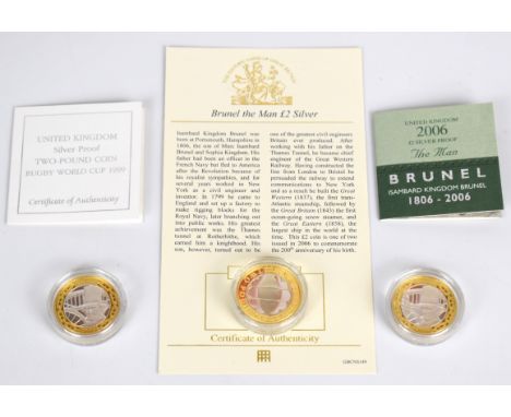 Three proof silver and gold plated &pound;2 coins comprising two Brunel and a Rugby World Cup example, with certificates