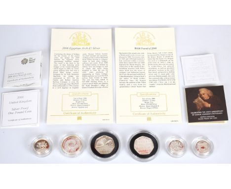 Six silver proof coins comprising three &pound;1, two 50p Dictionary and Libraries and a United Nations &pound;2, most with c