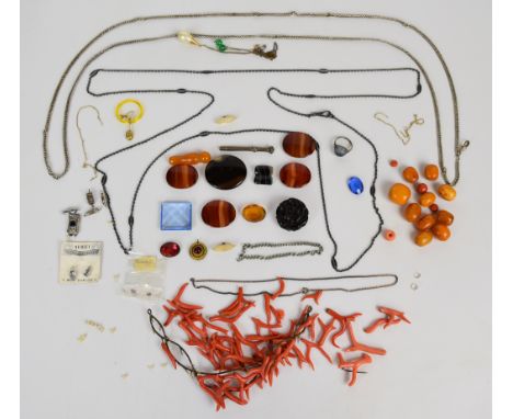 A collection of jewellery including silver ring, gun metal guard chain, agate plaques, sections of coral, ten amber beads, et