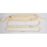 A single strand of cultured pearls with 14k gold clasp, three strand cultured pearl necklace with
