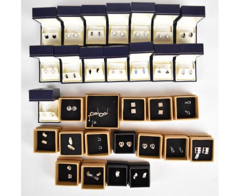 Thirty-one pairs of silver earrings set with diamonds and fourteen enamel set pairs&nbsp;