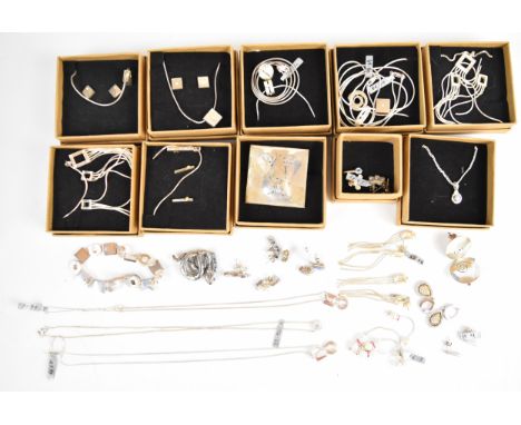 Five suites of silver jewellery comprising necklace and earrings set with diamonds, five silver pendants set with diamonds on