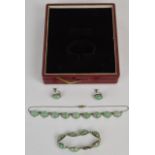 A suite of silver jewellery comprising earrings, bracelet and necklace set with aventurine quartz