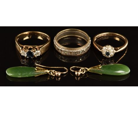 Two 9ct gold rings set with sapphires and diamonds (4.4g), a 9ct gold and silver eternity ring and a pair of 9ct gold earring