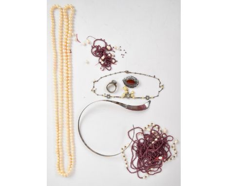 A silver choker, silver brooch and silver Suarti ring set with an opal triplet, a pearl necklace, garnet and pearl necklace a