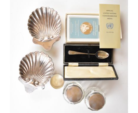 Hallmarked and other silver items comprising a pair of shell shaped dishes, pair of Victorian silver lidded cut glass pots, h
