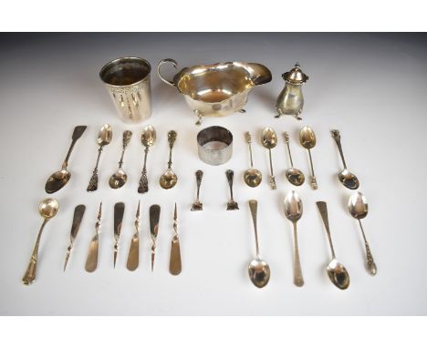 Hallmarked silver items comprising sauce boat, length 15cm, thirteen spoons including Art Nouveau and apostle examples, napki