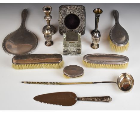 Hallmarked silver mounted items to include hand mirror, four hand brushes, pocket watch holder, salt and pepper, candlestick,
