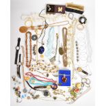 A collection of jewellery, some silver including charm bracelet, bracelet with pressed amber