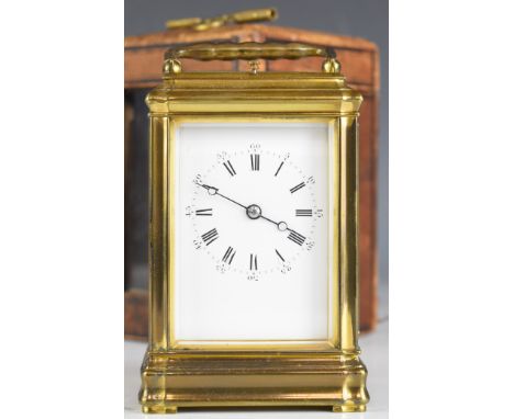 19th century brass cased repeating carriage clock with bevelled glass panels, striking on a gong, in original travel case, he