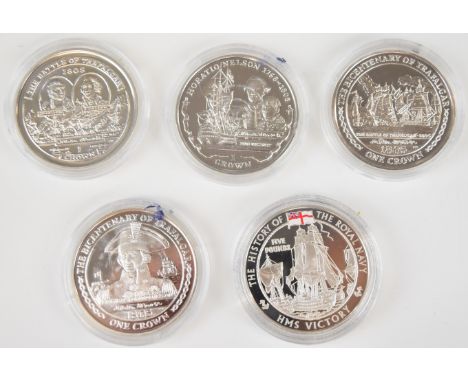 Five silver one crown coins to commemorate The Battle of Trafalgar and HMS Victory, all in capsules&nbsp;