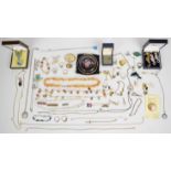 A collection of jewellery, some silver including four rings, three necklaces and a St Christopher,
