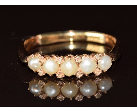 Victorian yellow metal ring ring set with five split pearls and rose cut diamonds (two missing), 3.2g, size P