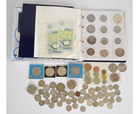 An amateur coin collection mostly contained in an album to include George III 1819 crown, Queen Victoria crown and double flo