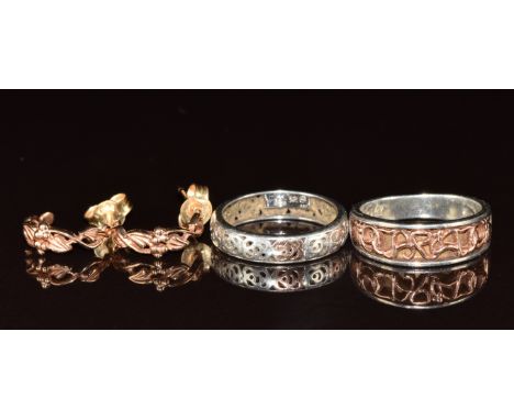 A pair of 9ct rose gold Clogau earrings (1.9g) and two silver Clogau rings with applied gold decoration