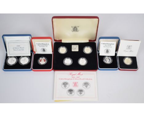 Nine Royal Mint silver proof coins comprising 1984-1987 &pound;1 set of four, 1989 &pound;2 two coin set, 1988 and 1983 &poun